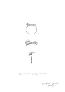 curiouser-and-curiouser-bow-bangle-alice-in-wonderland curiouser-and-curiouser-bow-bangle-alice-in-wonderland
