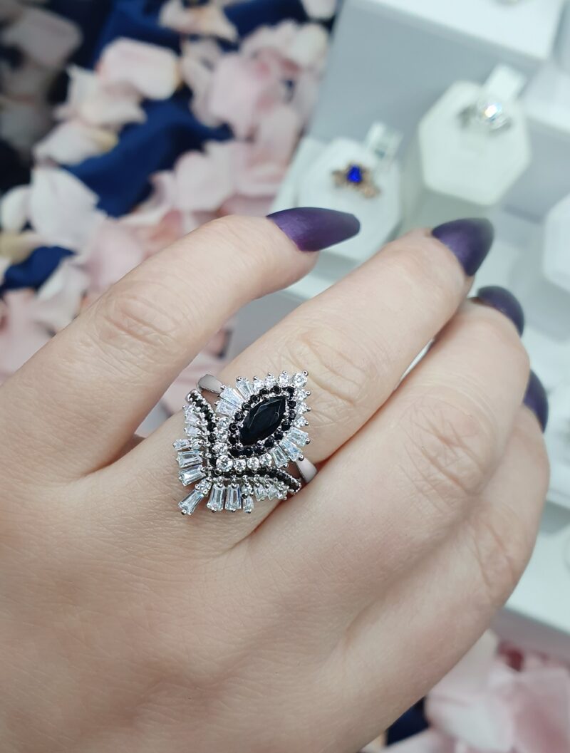 naila-marquise-cut-black-diamond-halo-gold-bridal-set-photo