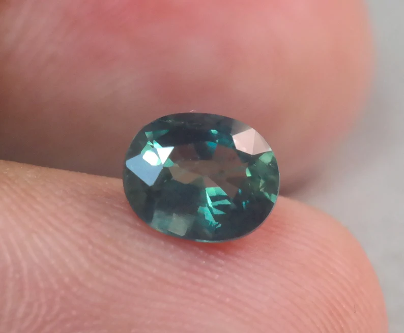 1-34ct-natural-blue-green-sapphire-oval-cut